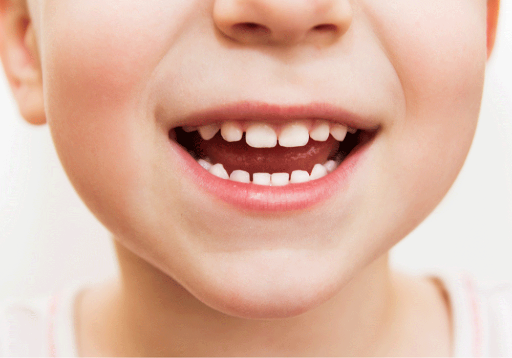 Close up shot of a small child's smile